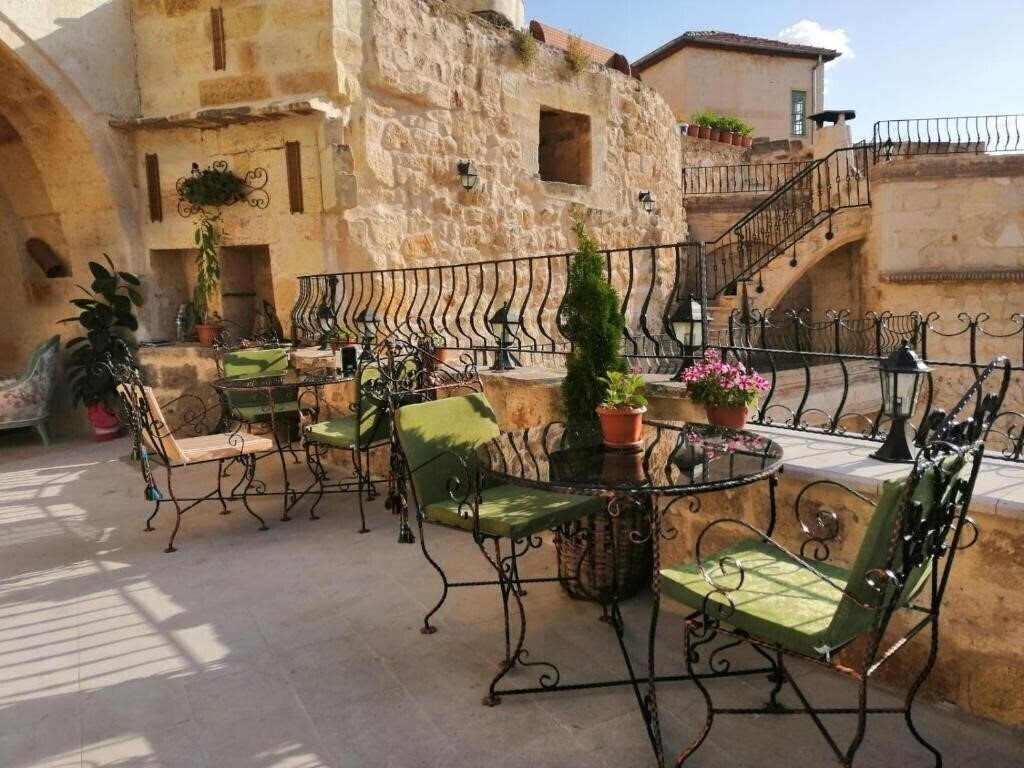 Фото Casia Cave Suites 4*