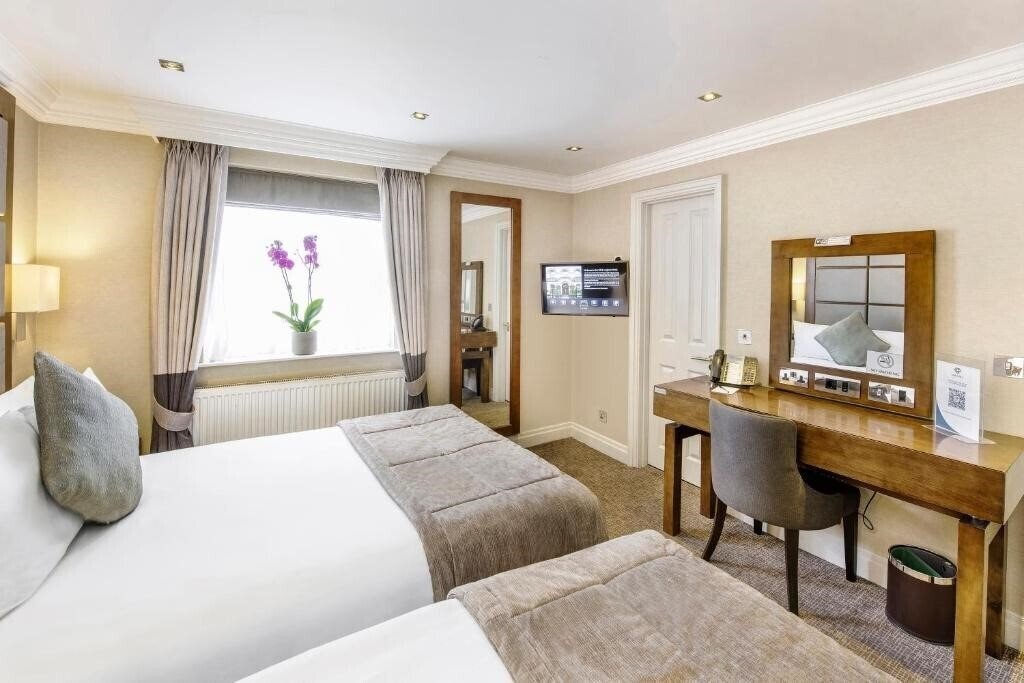 Фотография Grange Langham Court 4*