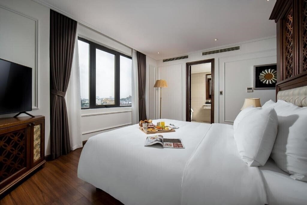 Фото The Q Hotel 4*