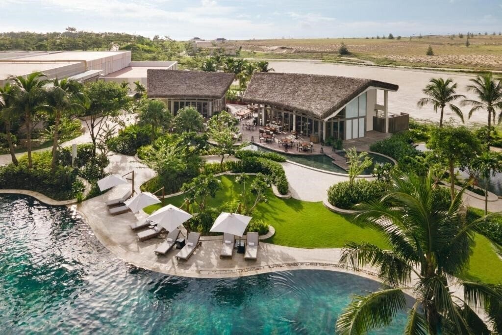 Фото New World Hoiana Hotel 5*