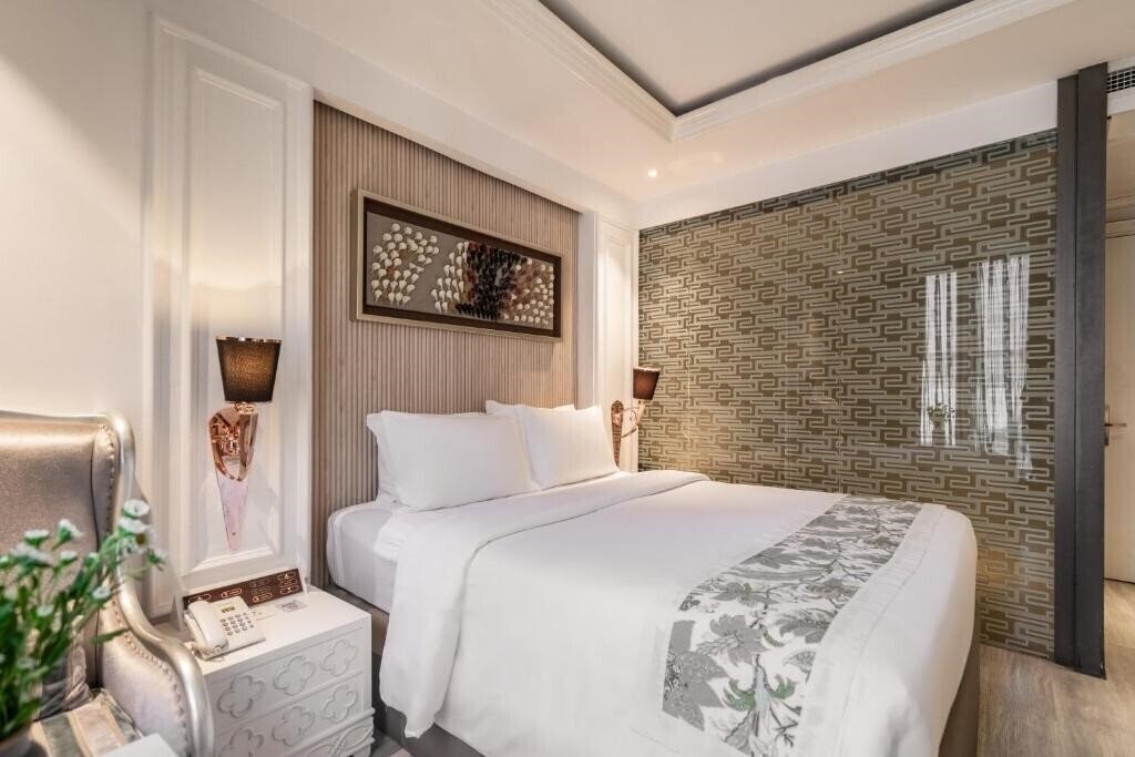 Фото A&EM Saigon Hotel 4*